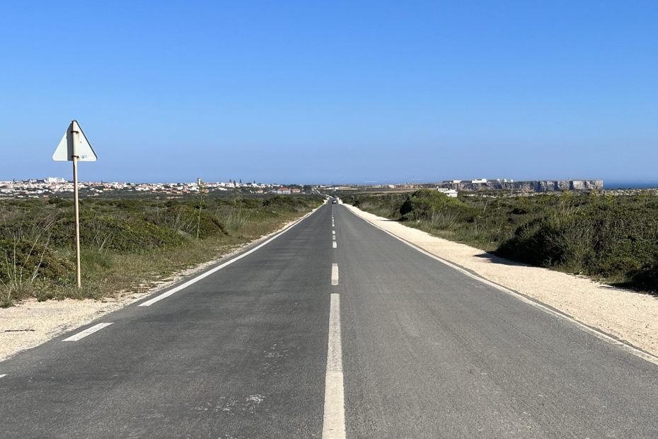 Photo of a timeless, basic straight track going all the way to the horizon.